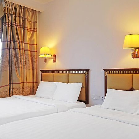 Super Oyo 90464 Borneo Suites Hotel コタキナバル エクステリア 写真