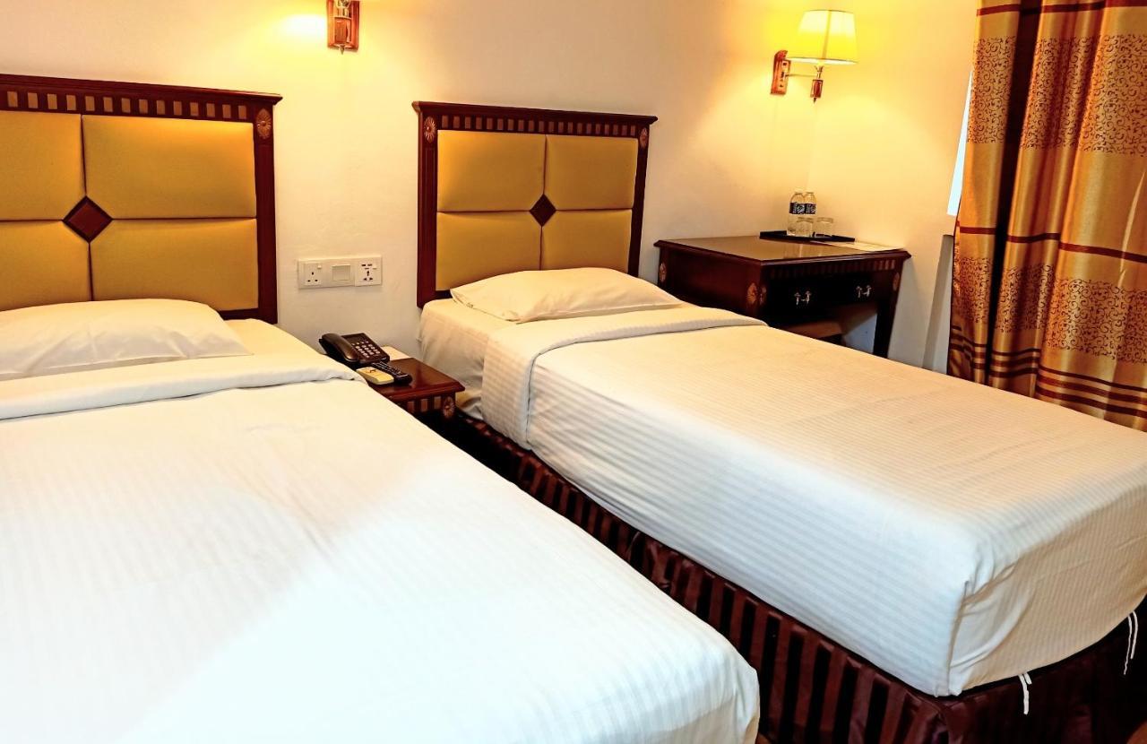Super Oyo 90464 Borneo Suites Hotel コタキナバル エクステリア 写真