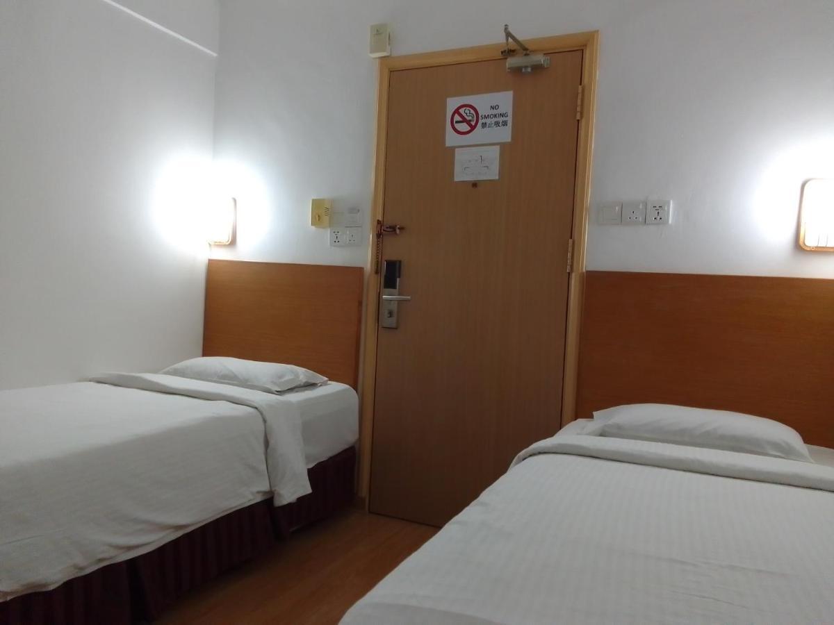 Super Oyo 90464 Borneo Suites Hotel コタキナバル エクステリア 写真