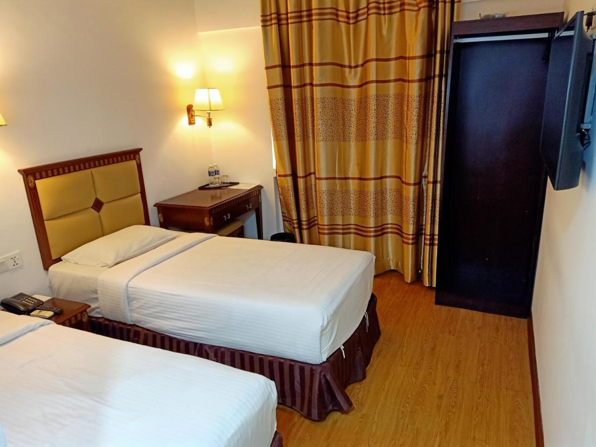 Super Oyo 90464 Borneo Suites Hotel コタキナバル エクステリア 写真