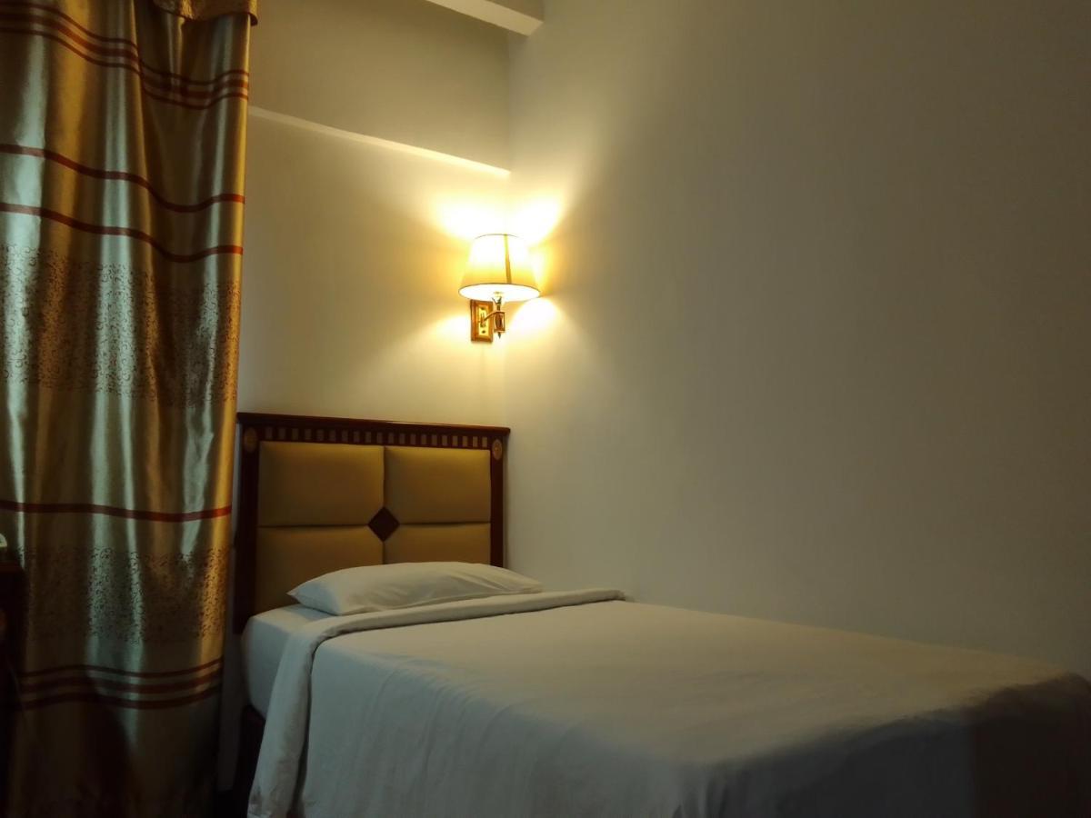 Super Oyo 90464 Borneo Suites Hotel コタキナバル エクステリア 写真
