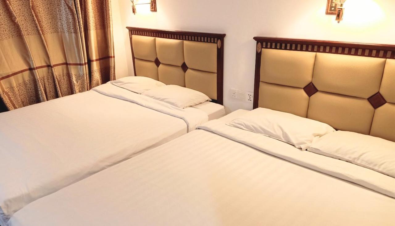 Super Oyo 90464 Borneo Suites Hotel コタキナバル エクステリア 写真