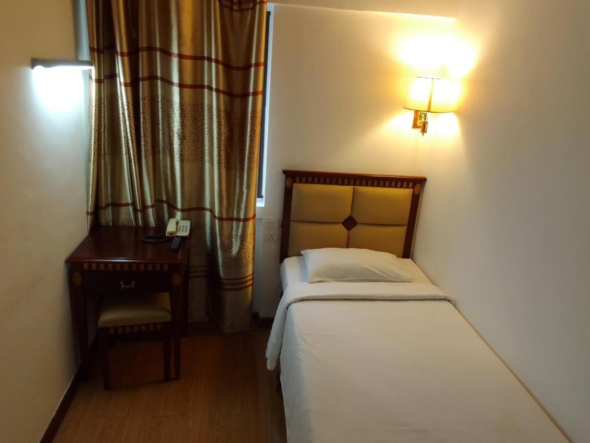 Super Oyo 90464 Borneo Suites Hotel コタキナバル エクステリア 写真