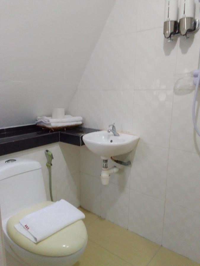 Super Oyo 90464 Borneo Suites Hotel コタキナバル エクステリア 写真