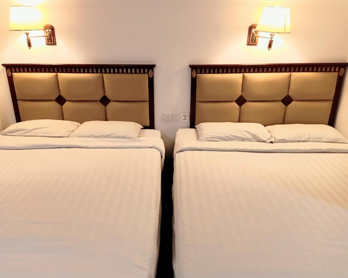 Super Oyo 90464 Borneo Suites Hotel コタキナバル エクステリア 写真