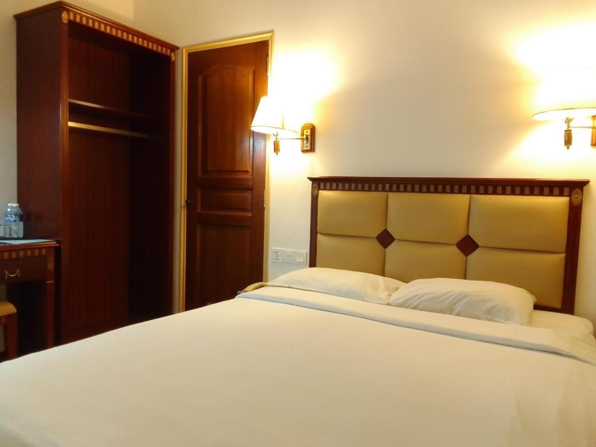 Super Oyo 90464 Borneo Suites Hotel コタキナバル エクステリア 写真