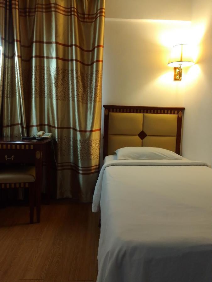 Super Oyo 90464 Borneo Suites Hotel コタキナバル エクステリア 写真