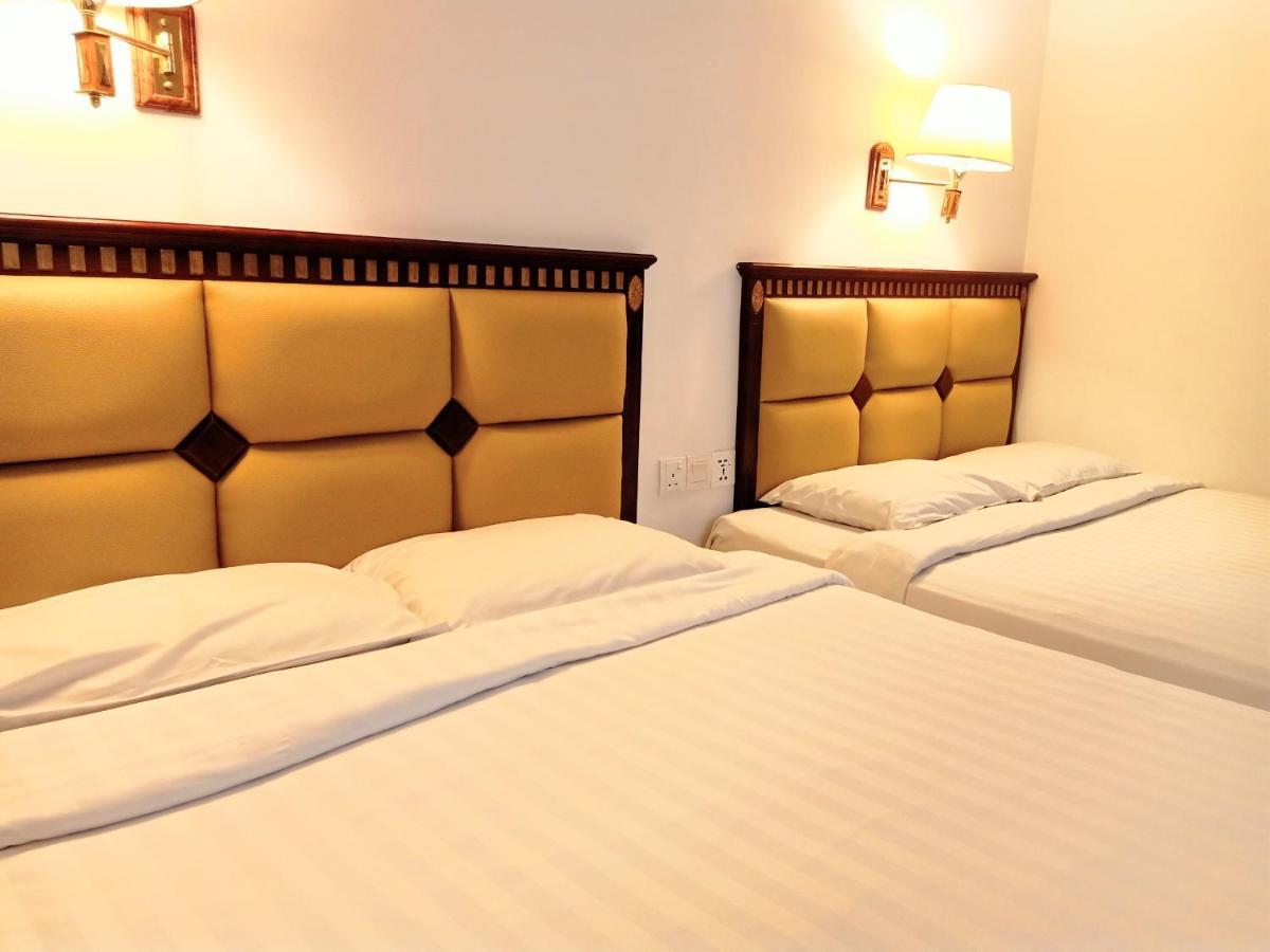 Super Oyo 90464 Borneo Suites Hotel コタキナバル エクステリア 写真